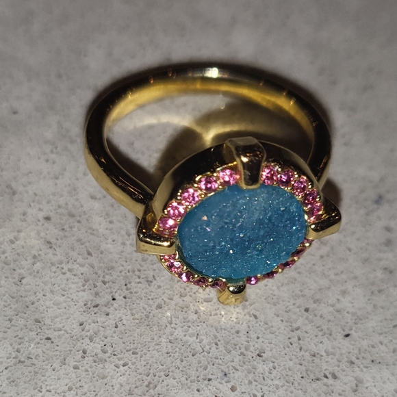 A gold-plated brass ring adorned with colorful semiprecious stones. - Picture 5 of 11
